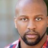 Aaron D. Alexander as Young Pastor Robert